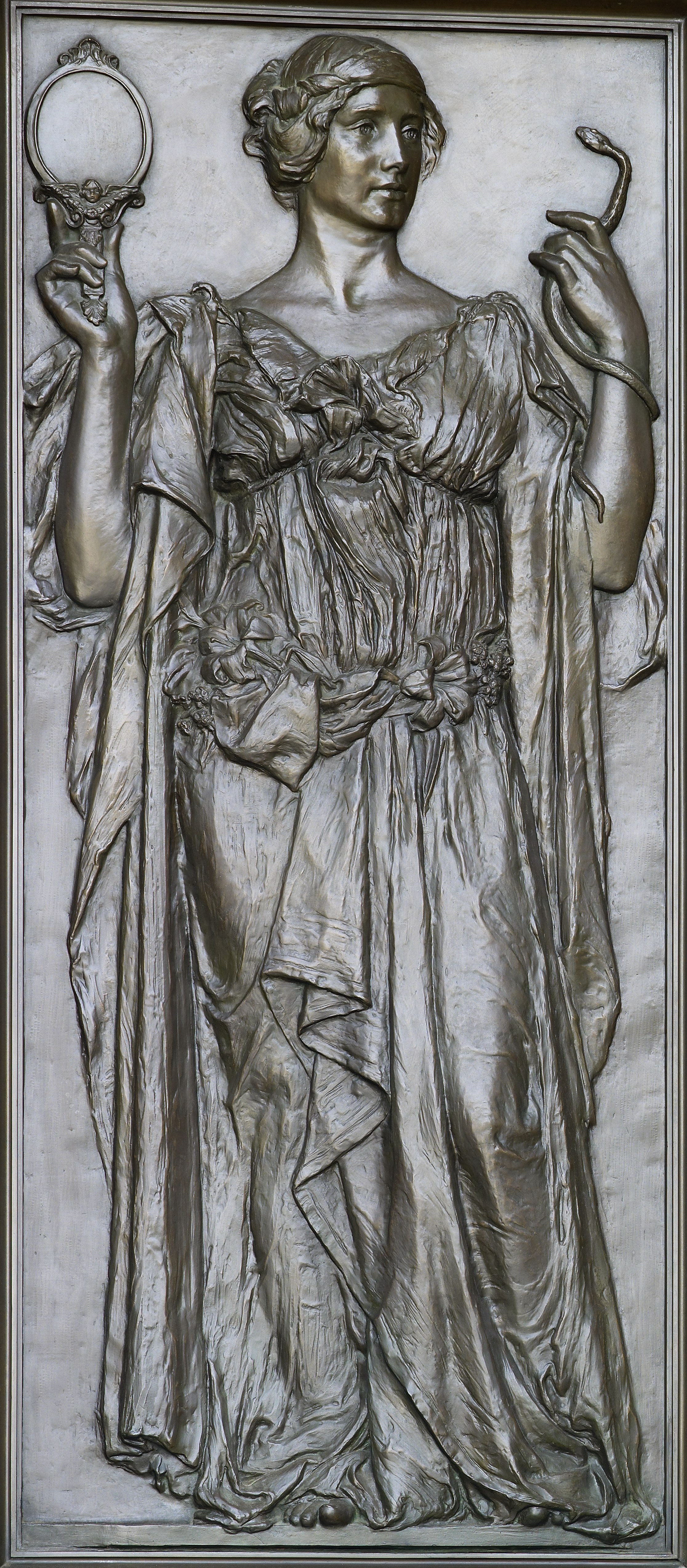 bronze statue of Athenian woman holding mirror in one hand and snake in the other